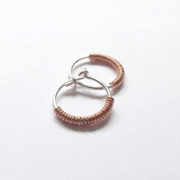 silver hoop wrapped with copper