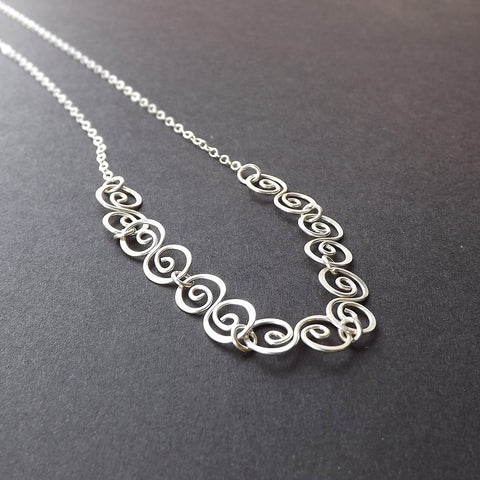 silver swirl necklace