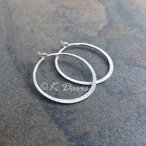 silver hoop earrings in a medium size